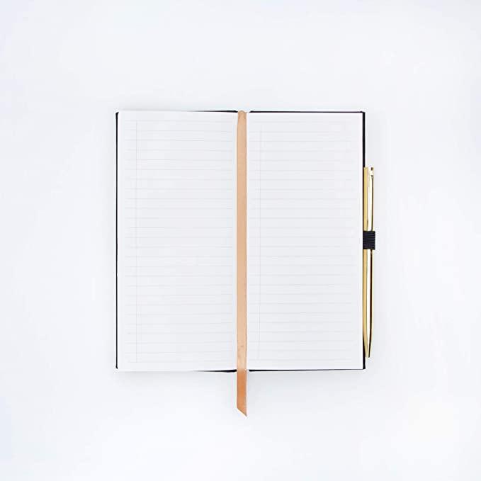Image showcasing the 'Deep Dark Secrets Notebook', featuring an elegant, dark cover.