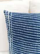 Image of the 'Indigo Blue Square Pillow Cover', showcasing its vibrant indigo color and fine cotton material, designed by Indian master artisans.