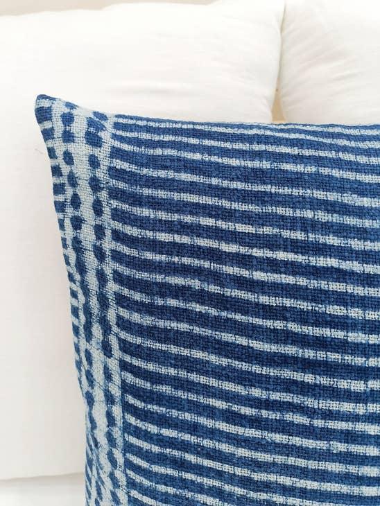Image of the 'Indigo Blue Square Pillow Cover', showcasing its vibrant indigo color and fine cotton material, designed by Indian master artisans.