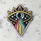 Cosmic Evil Eye Rainbow Patch, featuring a captivating blend of the evil eye symbol, cosmic design, and colorful rainbow.