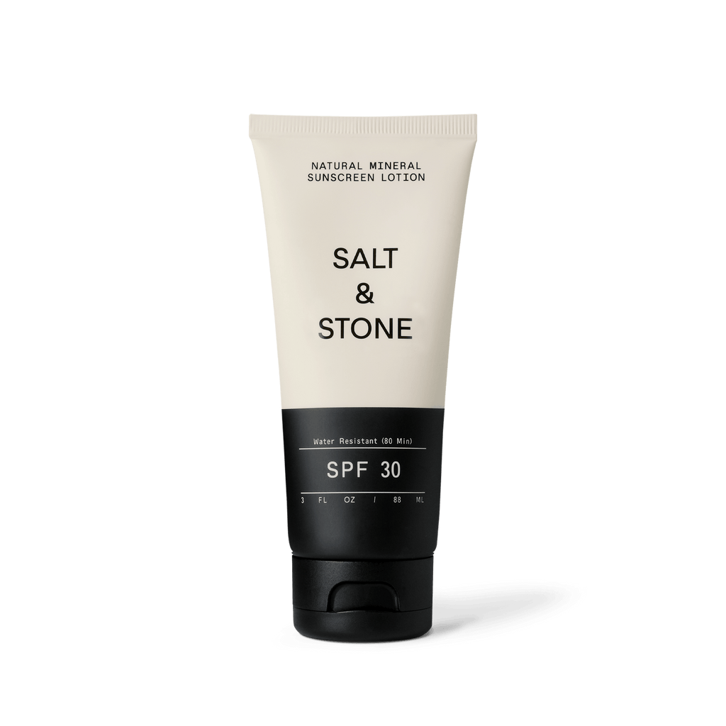 Salt and Stone Natural Mineral Sunscreen Lotion SPF 30 - A white tube of sunscreen with the Salt and Stone logo, featuring a mineral-based formula for sun protection.