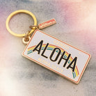 Aloha Enamel Keychain featuring a colorful rainbow and “Aloha” text.