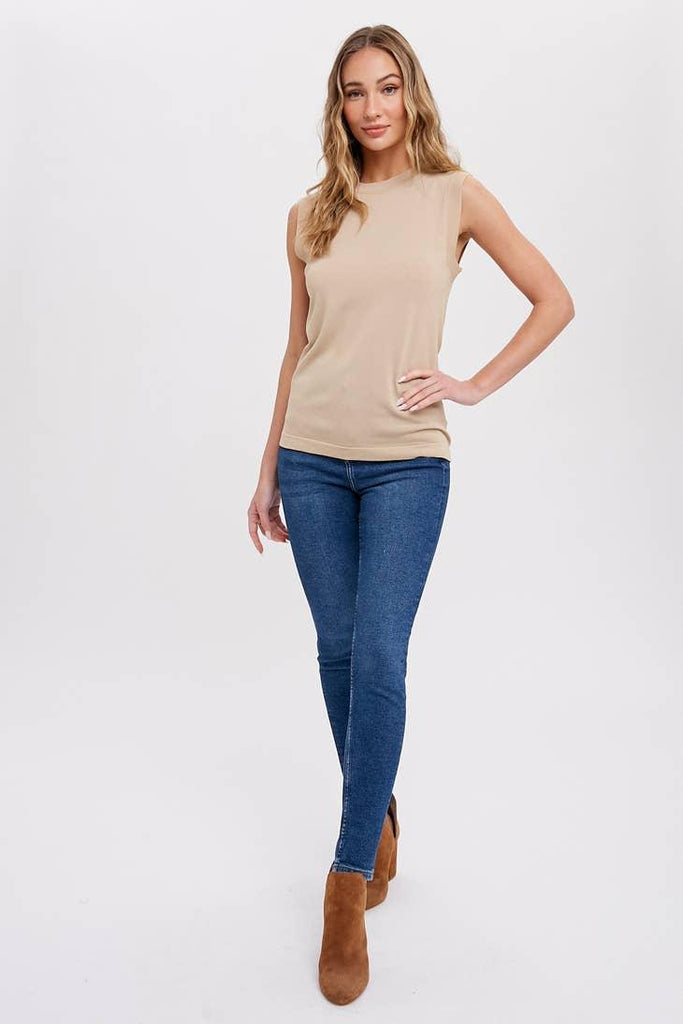 High Neck Sleeveless Top - A chic wardrobe essential with a high neckline, offering versatile style for any occasion.