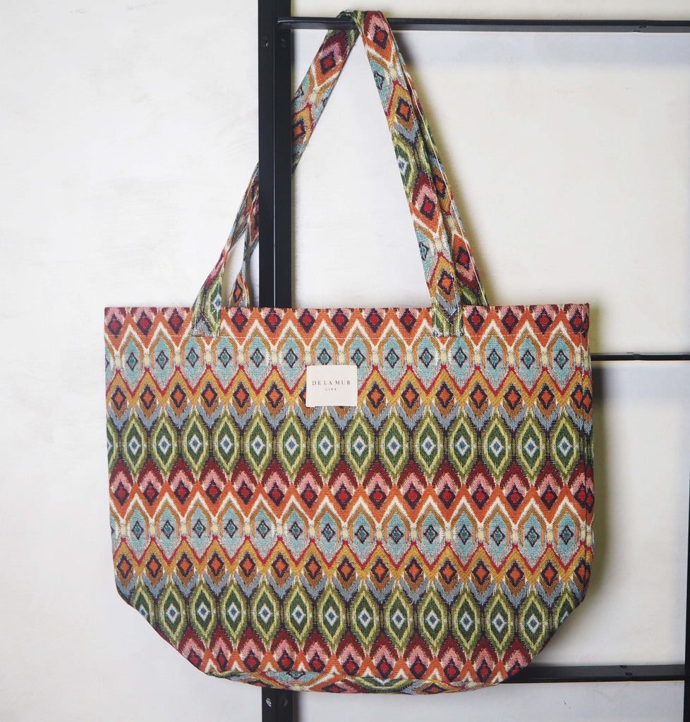Dimi Tote Large fashioned from durable materials, showcasing a contemporary design with plenty of room