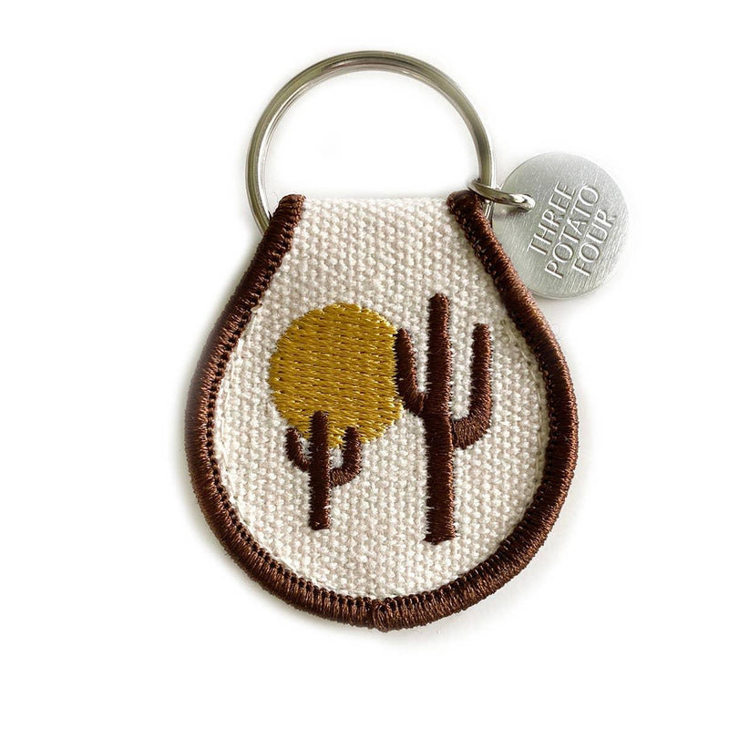 Desert Vibes Patch Keychain - A stylish accessory featuring an intricately designed patch inspired by desert landscapes.