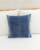 Image of the 'Indigo Blue Square Pillow Cover', showcasing its vibrant indigo color and fine cotton material, designed by Indian master artisans.