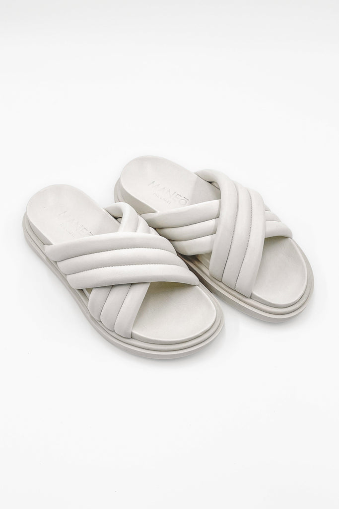 Anna Sandals, made from 100% genuine leather, displayed against a neutral background, showcasing their classic design and quality craftsmanship.