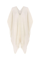 A woman gracefully wearing the Ava Kimono, showcasing its flowing silhouette, delicate patterns, and high-quality fabric.