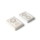Image of Celestial Heavens Playing Cards with sleek cosmic designs, gold foil-stamped cards and a matching tuck box.