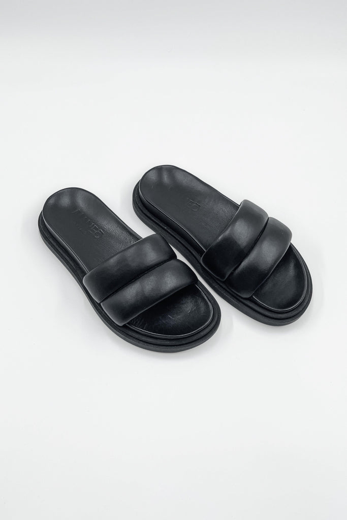 Diana Sandals, crafted from 100% genuine leather, displayed elegantly against a neutral background, showcasing their classic and timeless design.