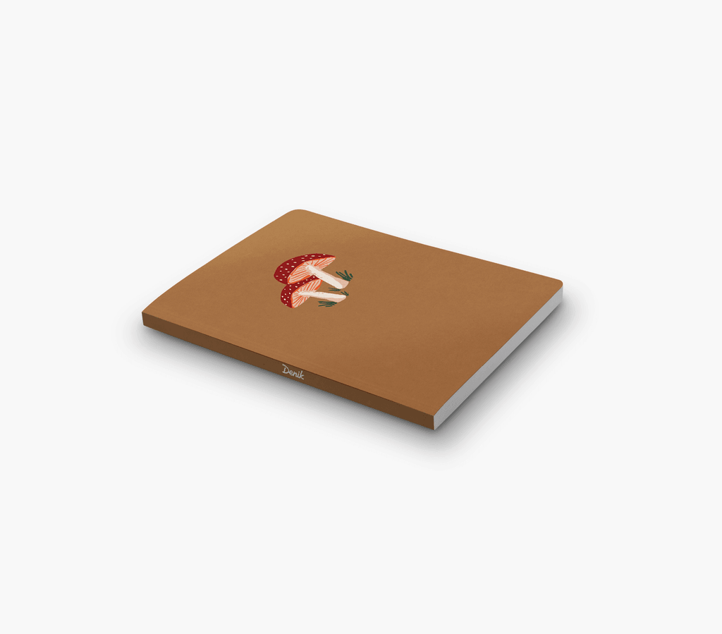 Golden Mushroom Notebook with a sparkling, gold-embossed fungi design on a dark, matte cover.