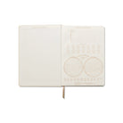Image showcasing the 'La Lune Cloth Covered Journal', adorned with a beautifully designed moon-themed fabric cover.