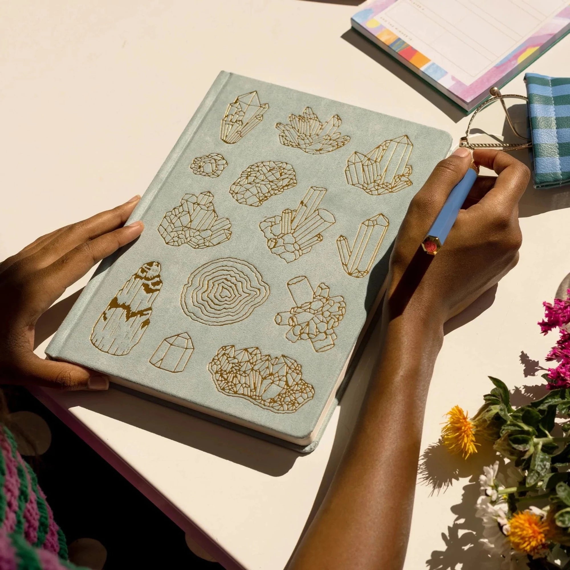 Image showcasing the 'Mineralogy Cloth Covered Journal' featuring a rich, mineral-inspired fabric cover design.