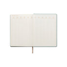 Image showcasing the 'Mineralogy Cloth Covered Journal' featuring a rich, mineral-inspired fabric cover design.