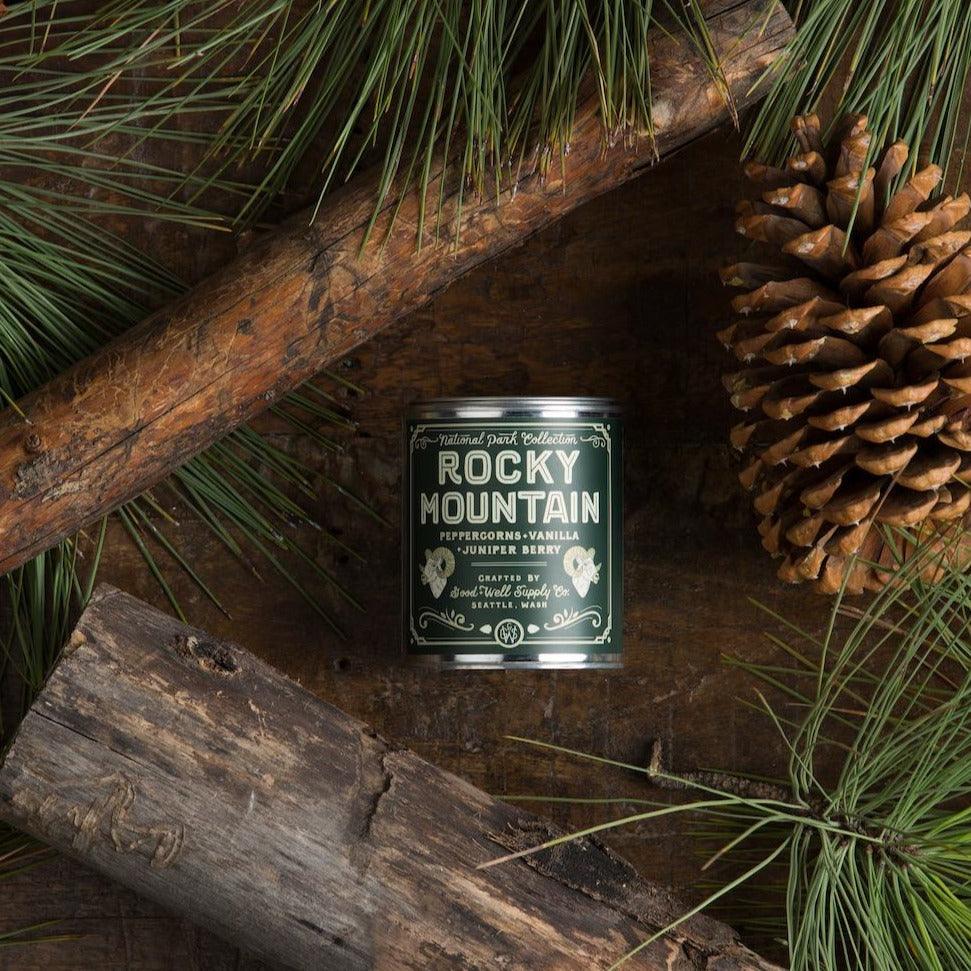 Rocky Mountain Soy Candle in sustainable packaging, emanating a brisk, woodsy scent reminiscent of the majestic mountain range.
