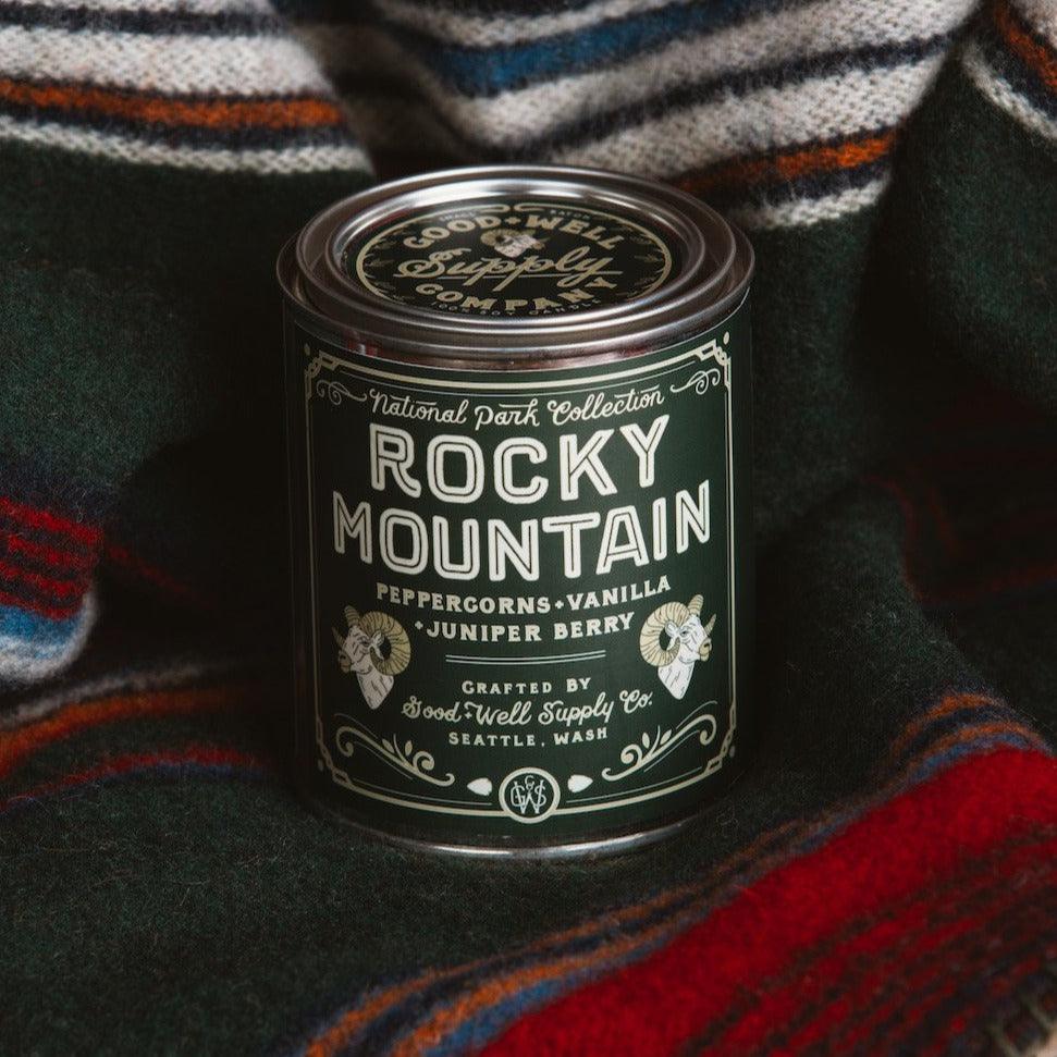 Rocky Mountain Soy Candle in sustainable packaging, emanating a brisk, woodsy scent reminiscent of the majestic mountain range.
