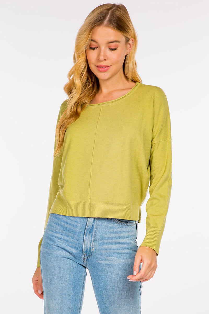 Sarah Sweater showcasing its luxurious fabric blend and versatile design, perfect for a sophisticated and comfortable look.