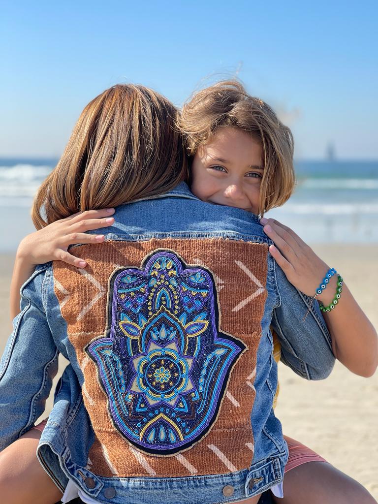 Hand Beaded Hamsa Levi's Jacket - Meticulously crafted with intricate Hamsa beadwork. Elevate your style with this meaningful and stylish Levi's jacket.