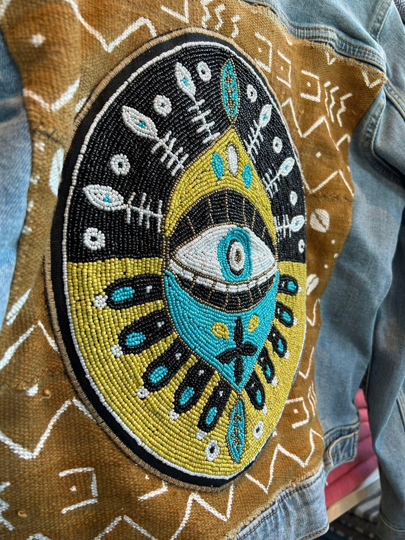 Hand Beaded Evil Eye Levi's Jacket - Intricately adorned with evil eye beadwork. Elevate your style with this unique and protective Levi's jacket.