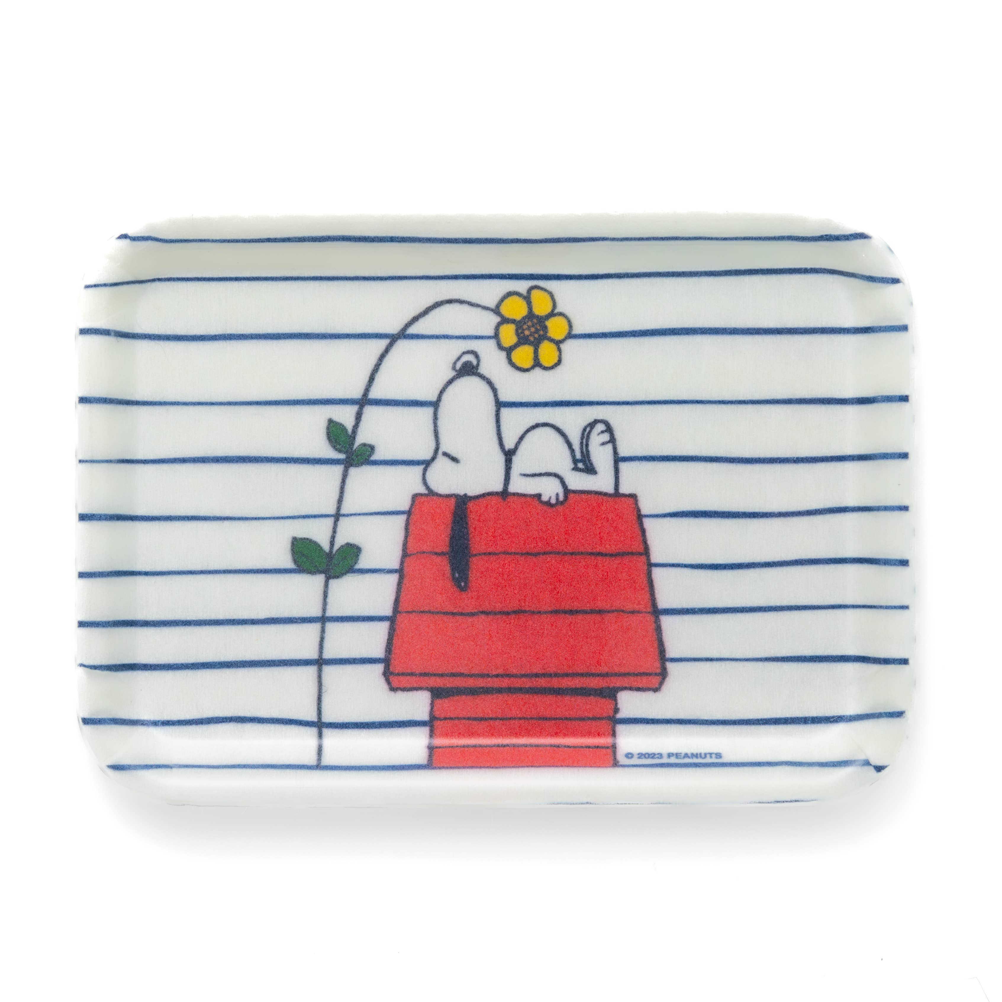Small tray featuring Snoopy on his red doghouse with a blooming flower, perfect for holding trinkets or snacks.