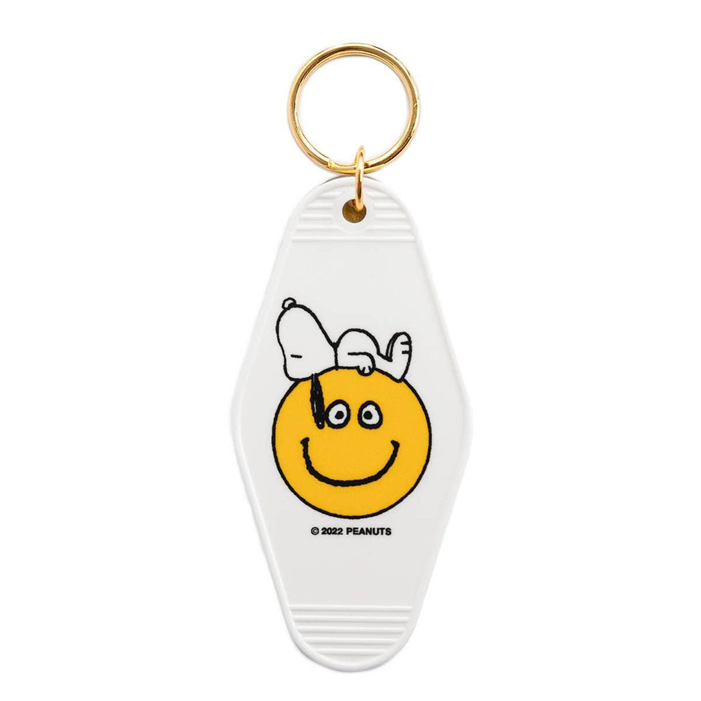 Peanuts Snoopy Smiley Key Tag - Snoopy with a big smile, a durable and charming key accessory spreading joy.