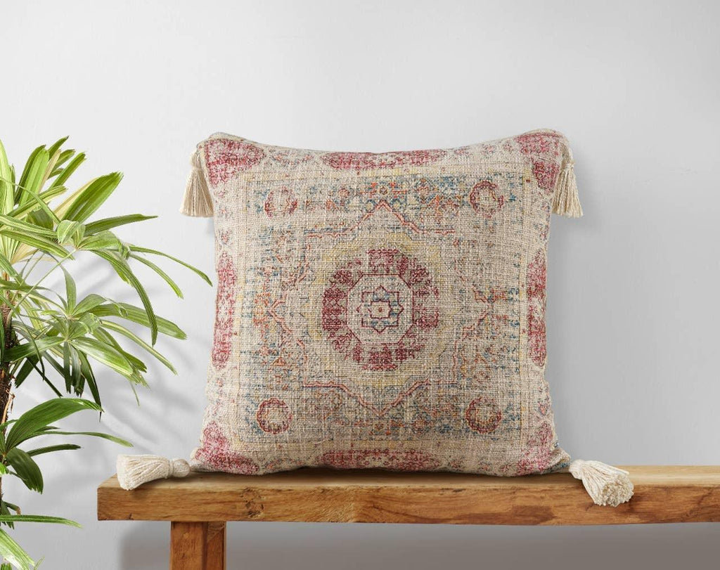 Image of the 'Handmade Printed Persian Cotton Pillow Cover', highlighting its soft, fluffy texture, the handmade tassels at each corner, and the intricate printed design.