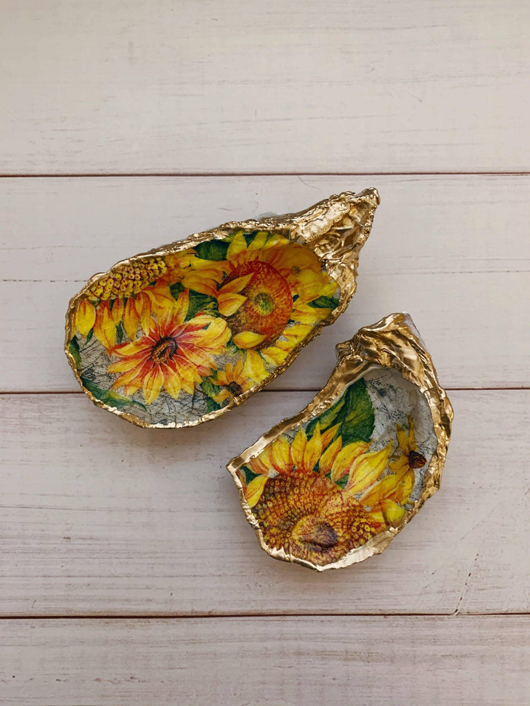 Sunflowers Shell with vibrant yellow sunflowers painted on it, symbolizing joy and warmth.