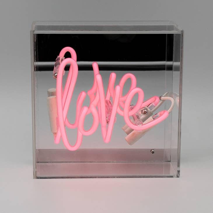 FORMA's Neon Love Light, a vibrant neon sign spreading warmth and affection in any setting.