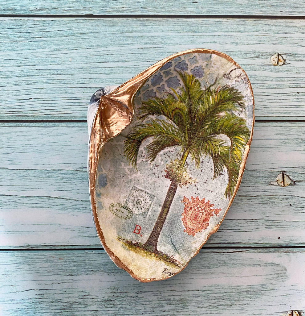 A Royal Palms Shell, intricately designed with a beautiful depiction of royal palm trees, symbolizing elegance and tropical tranquility.