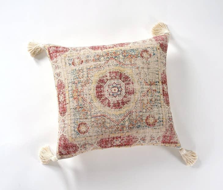 Image of the 'Handmade Printed Persian Cotton Pillow Cover', highlighting its soft, fluffy texture, the handmade tassels at each corner, and the intricate printed design.