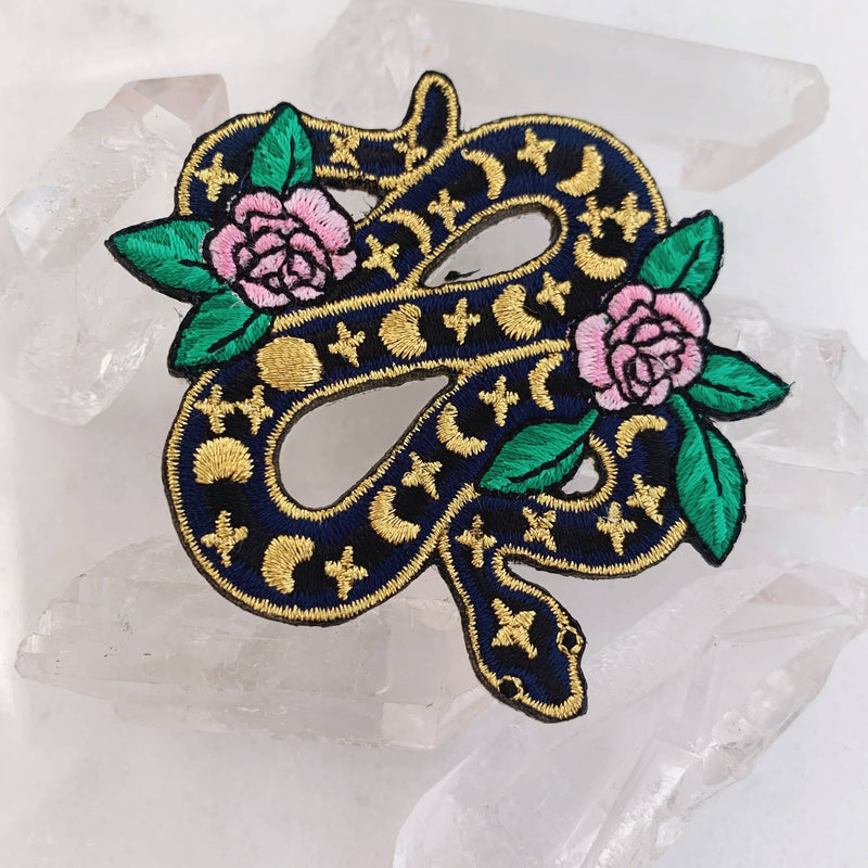 Serpent & Flower Patch - Captivating accessory featuring an enchanting combination of a serpent and delicate flowers.
