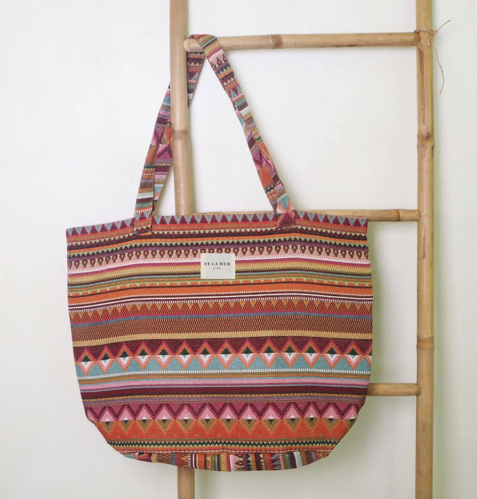 Noa Tote Large crafted from durable materials, featuring a classic design with generous room