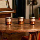 Spruce Soy Candle in sustainable packaging, releasing a fresh, revitalizing spruce forest scent.
