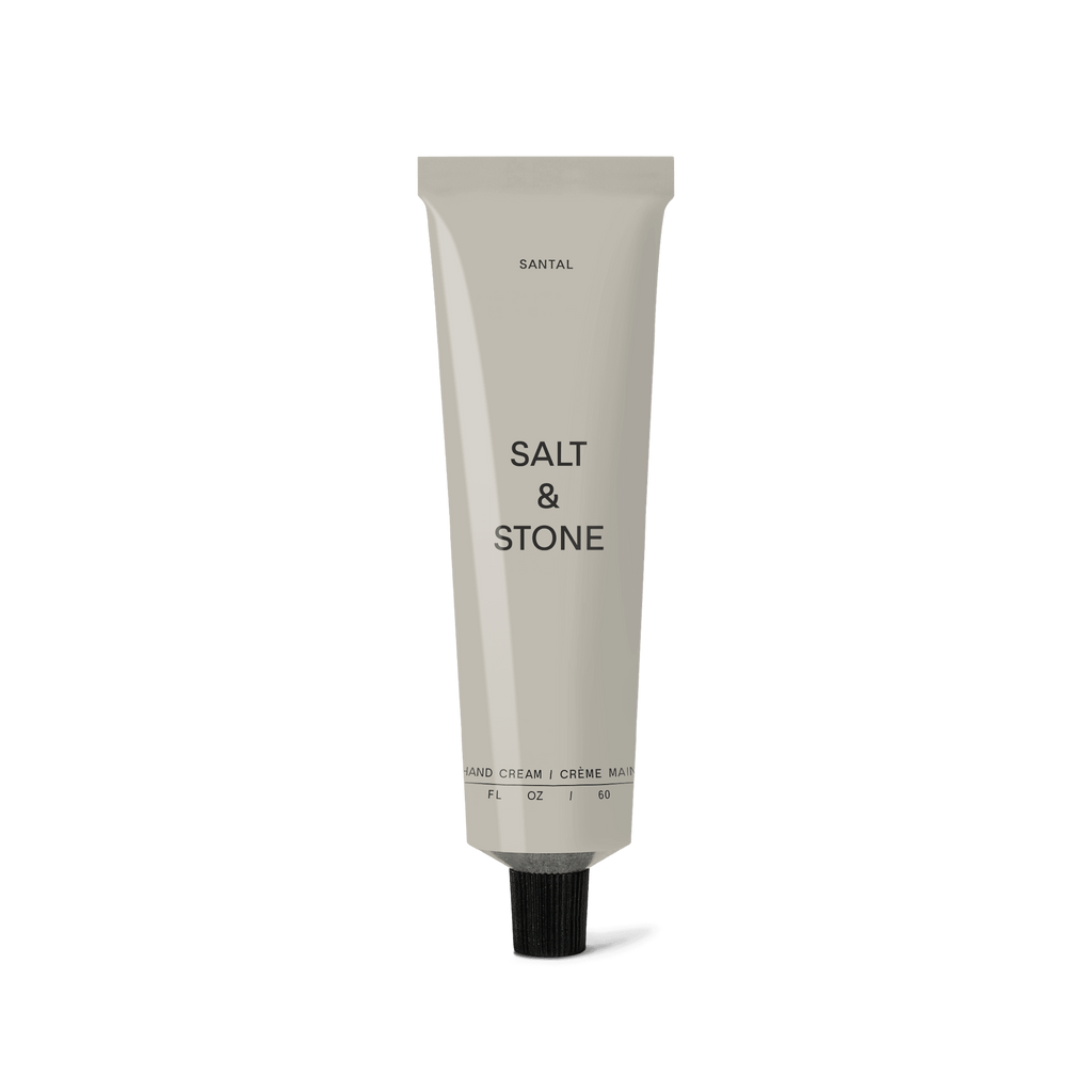 Image of Salt&Stone's Santal Hand Cream in a sophisticated, minimalist tube, available at Forma, set against a peaceful, neutral background.
