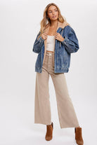 Fur Denim Jacket - A stylish blend of faux fur and classic denim, perfect for embracing warmth and timeless chic.