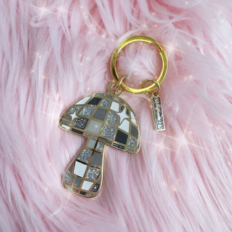 Disco Mushroom Enamel Keychain featuring a colorful, funky mushroom with a disco ball cap.