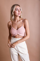 Woman in Forma's Knit Pattern Brami, demonstrating its detailed pattern and superior fit.
