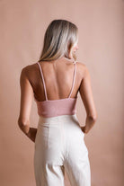Woman in Forma's Knit Pattern Brami, demonstrating its detailed pattern and superior fit.