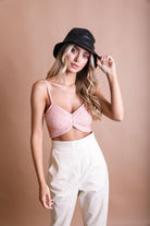 Woman in Forma's Knit Pattern Brami, demonstrating its detailed pattern and superior fit.