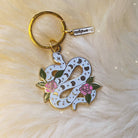 Serpent Enamel Keychain - Captivating accessory featuring a serpent design in vibrant enamel.