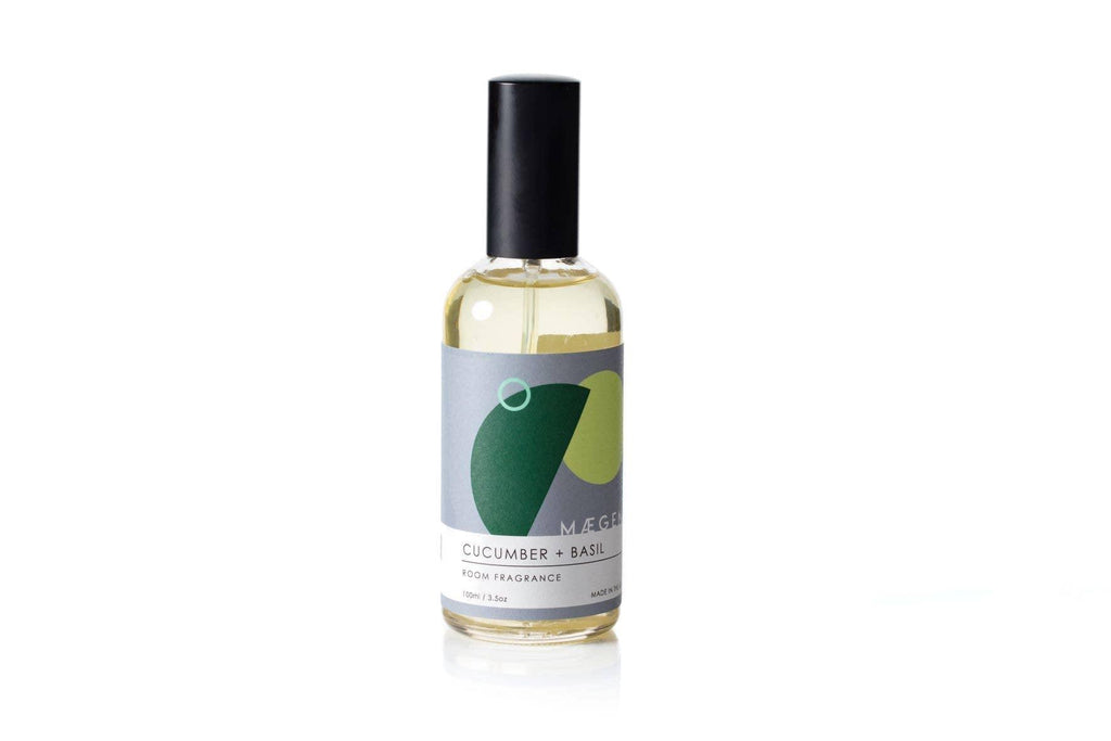 Room Fragrance - Green Tea + Lemon bottle on a clean, bright background, releasing an invigorating and refreshing scent.