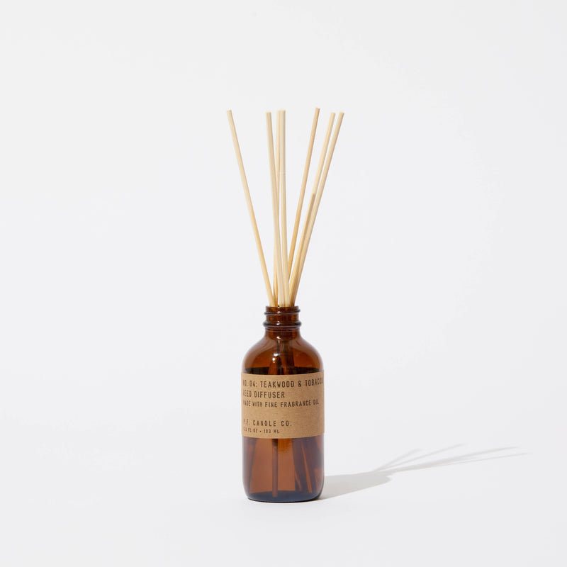 P.F. Candle Teakwood & Tobacco Diffuser - A carefully crafted diffuser with the rich and earthy aroma of teakwood and tobacco.