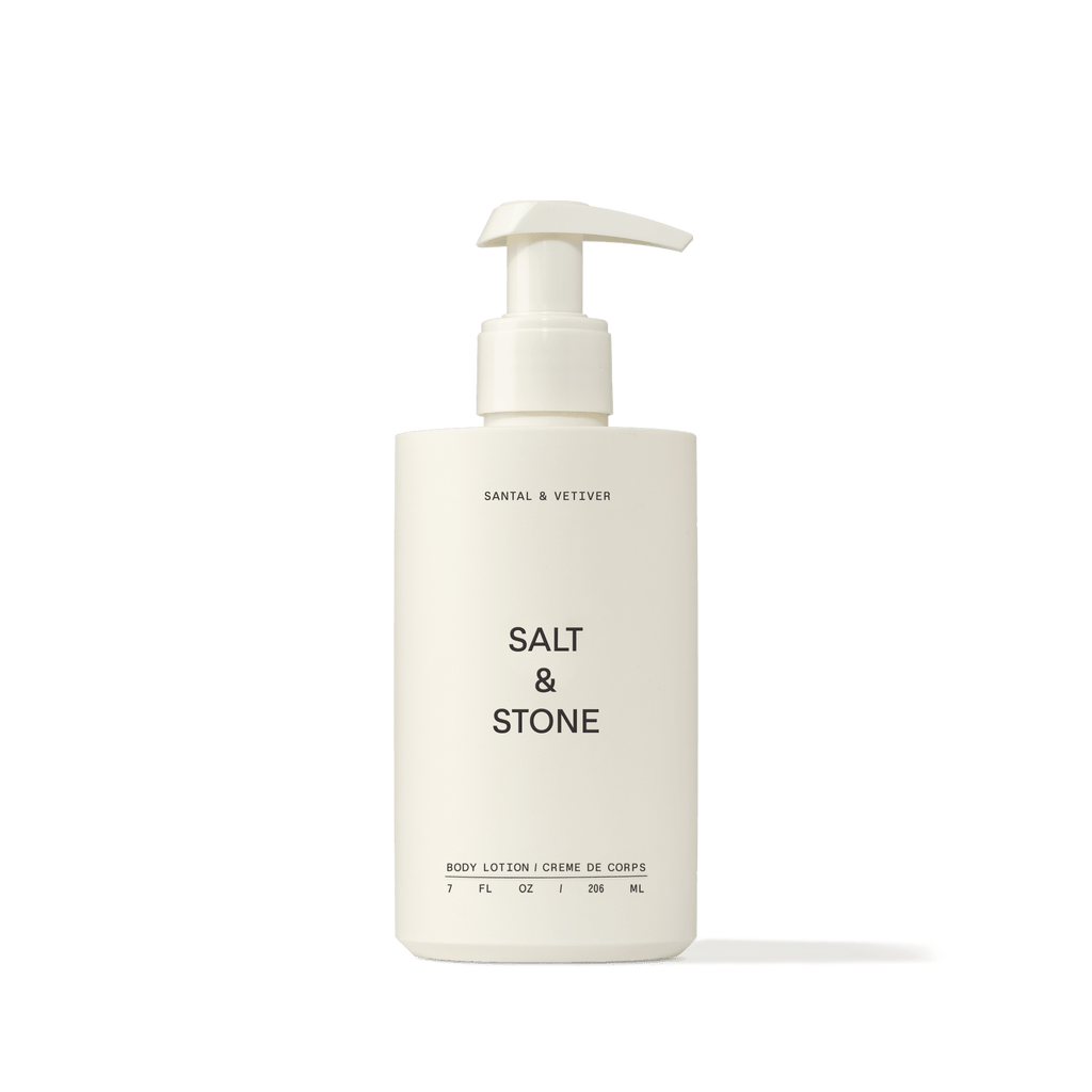 Bottle of Salt & Stone Body Lotion in Santal & Vetiver, a fast-absorbing formula infused with seaweed extracts and niacinamide.