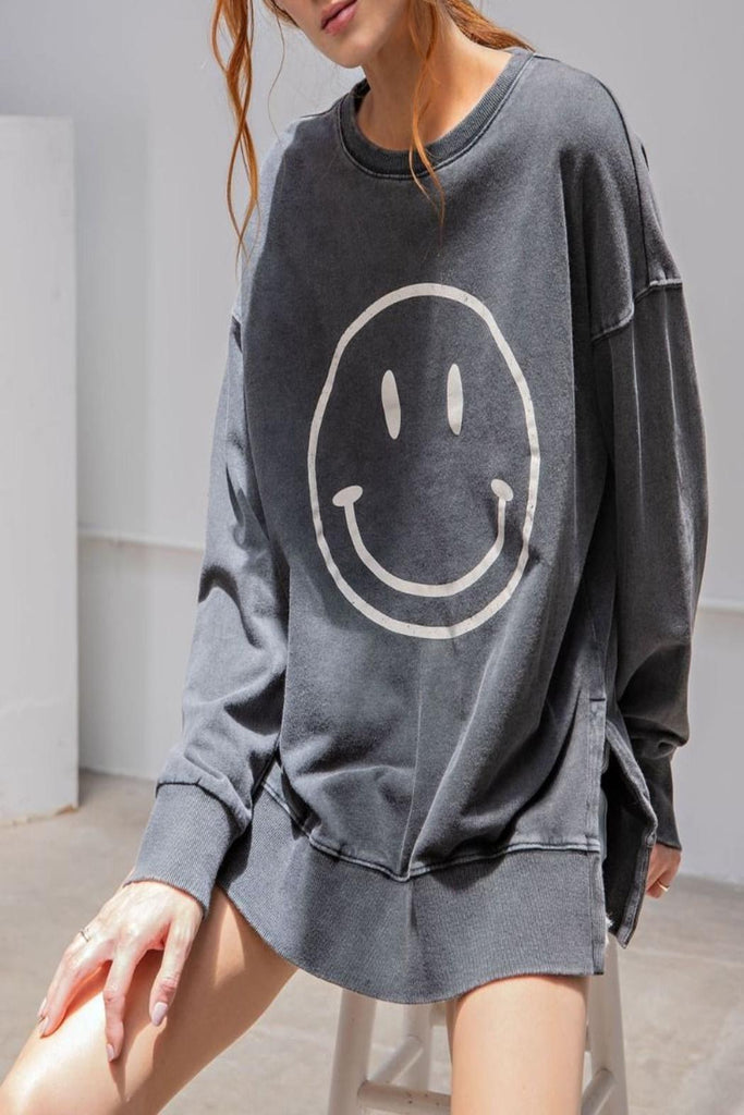 Smiley Face Sweatshirt - A cozy and cheerful essential featuring an embroidered smiley face for a touch of joy in your casual style.