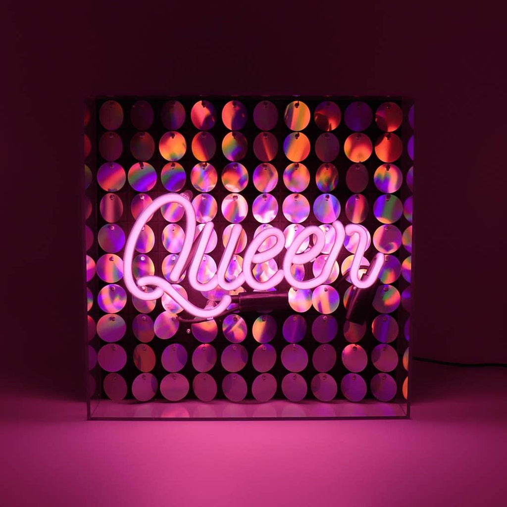 FORMA's Neon Queen Light, a radiant sign adorned with sequins, adding a touch of majesty and glamour to your decor.