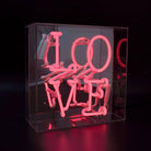 FORMA's Neon Love Box Light, a radiant symbol of love enclosed in a stylish box, perfect for any decor.