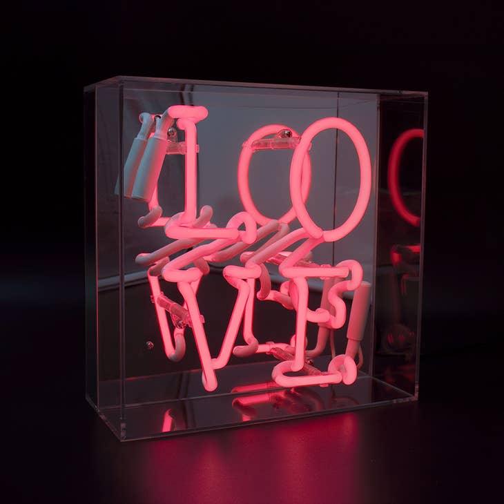FORMA's Neon Love Box Light, a radiant symbol of love enclosed in a stylish box, perfect for any decor.