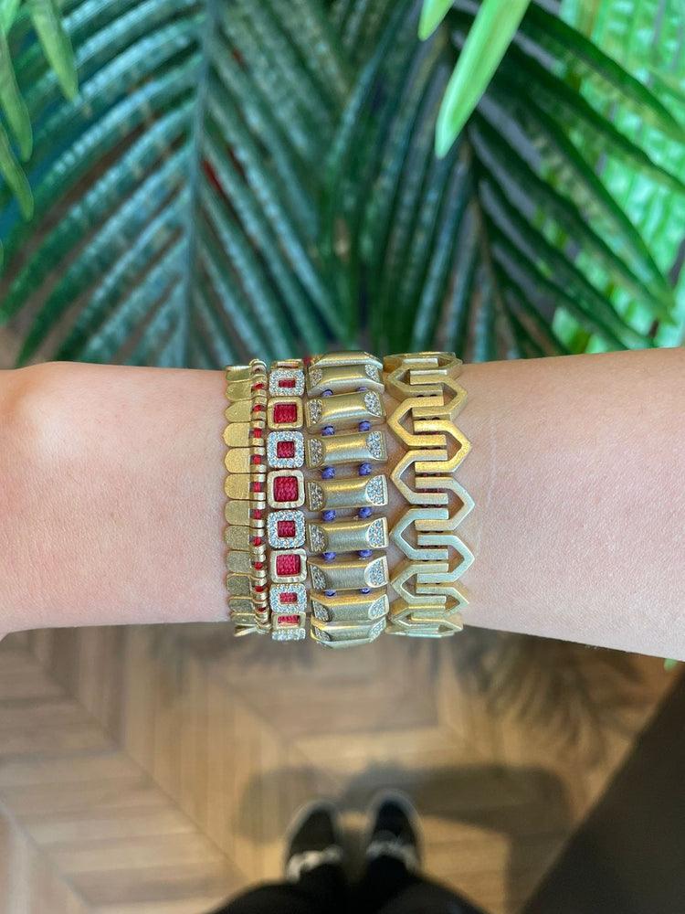 Roof Bracelet: A modern masterpiece inspired by architectural elegance.