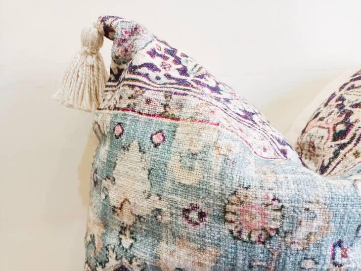 Image of the 'Handmade Printed Persian Cotton Cushion Cover', featuring its soft and fluffy texture, the handmade tassels at each corner, and the intricate printed design.