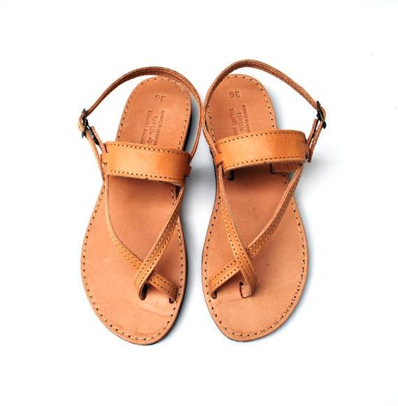 Forma Artisan Series Hera Flat Sandals in Cognac Brown - Meticulously handcrafted sandals with a classic design.